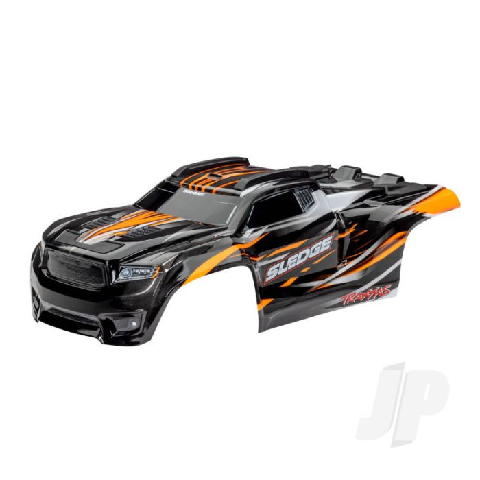 Traxxas Body, Sledge, Orange / Window, Grille, Lights Decal Sheet (Assembled With Front & Rear Body Mounts And Rear Body Support For Clipless Mounting) (TRX9511T) Traxxas Body, Sledge, Orange / Window, Grille, Lights Decal Sheet (Assembled With Front & Rear Body Mounts And Rear Body Support For Clipless Mounting) (TRX9511T)